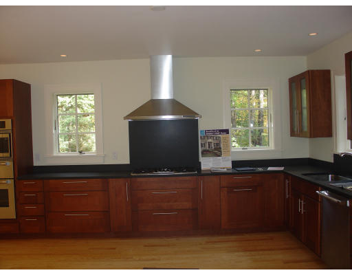 16 Page Farm Road Lincoln, MA 01773 - Photo 4 of 4 a kitchen with kitchen island sink and window