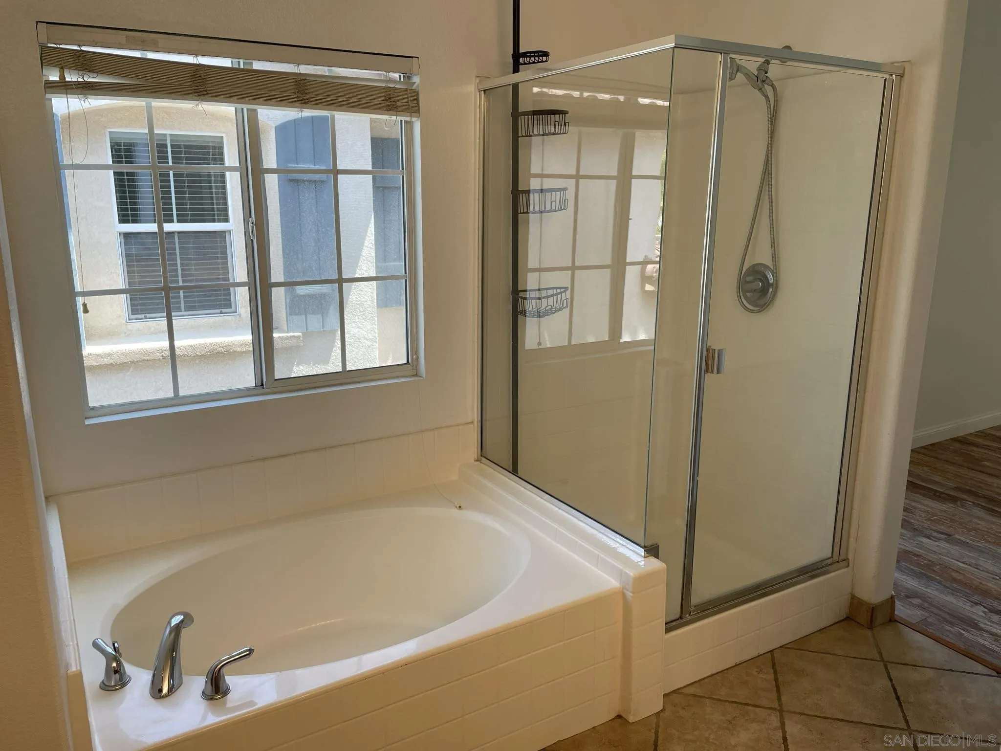 348 Monte Vista Way Oceanside, CA 92057 - Photo 11 of 20 a bathroom with a tub and shower