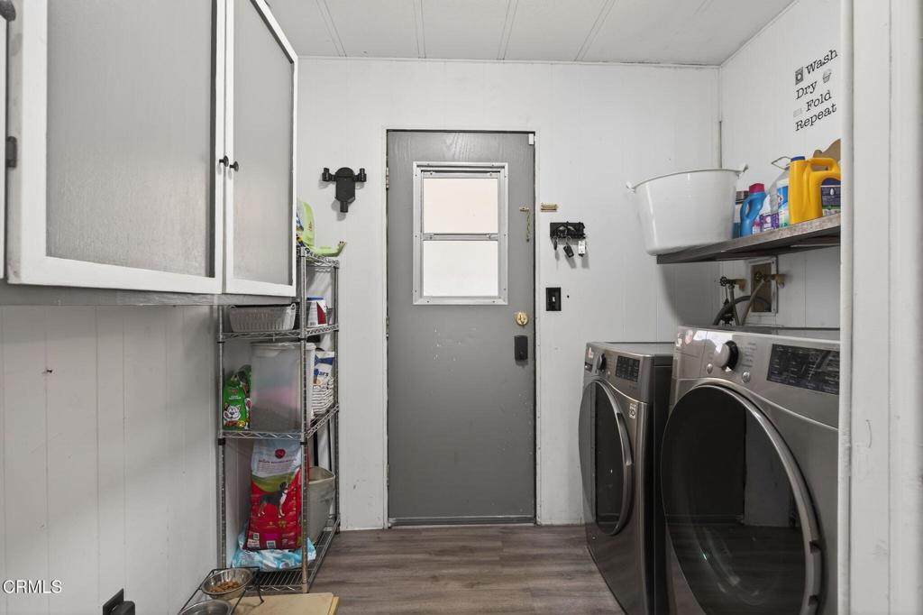 2408 Apple Lane, Unit 154 Oxnard, CA 93036 - Photo 26 of 46 a view of a storage and utility room with washer and dryer