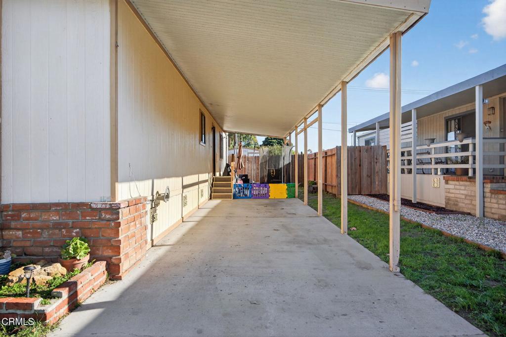 2408 Apple Lane, Unit 154 Oxnard, CA 93036 - Photo 27 of 46 a view of a backyard with seating space