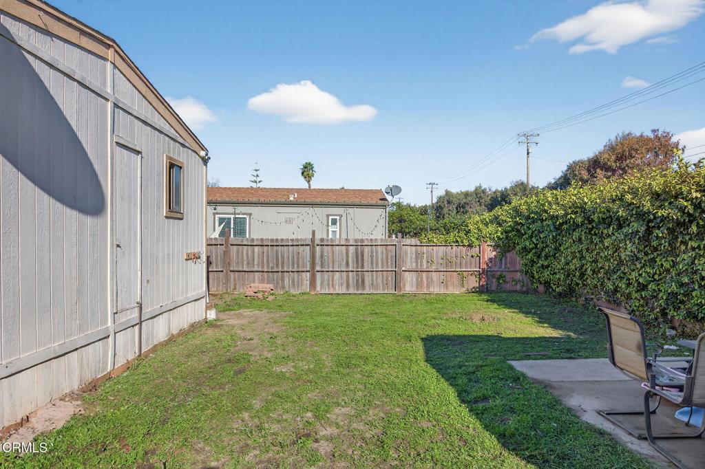 2408 Apple Lane, Unit 154 Oxnard, CA 93036 - Photo 31 of 46 a view of a backyard with a small cabin