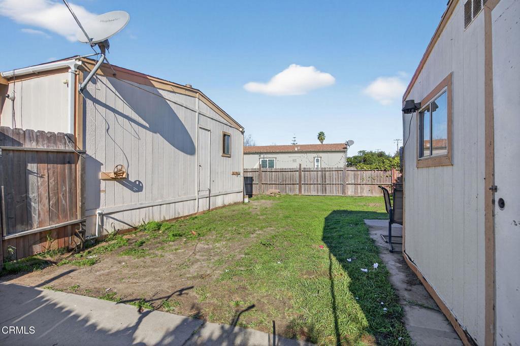 2408 Apple Lane, Unit 154 Oxnard, CA 93036 - Photo 32 of 46 a view of a house with a yard