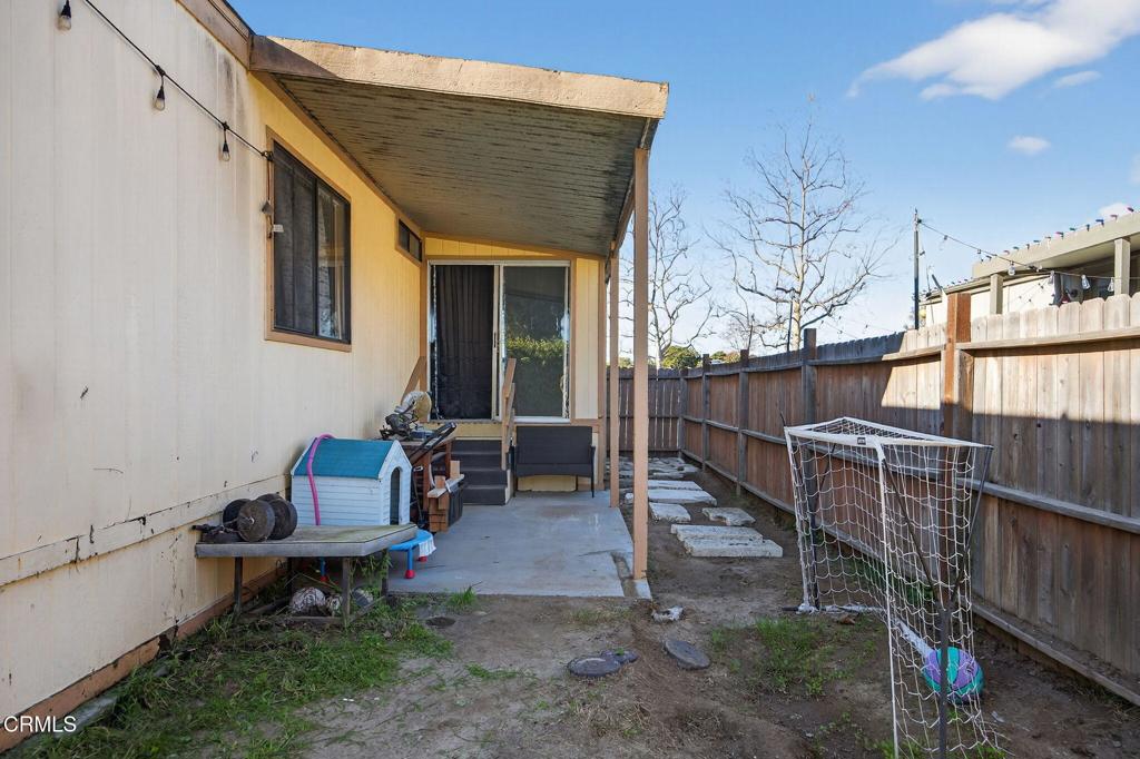 2408 Apple Lane, Unit 154 Oxnard, CA 93036 - Photo 36 of 46 a view of a house with backyard and sitting area
