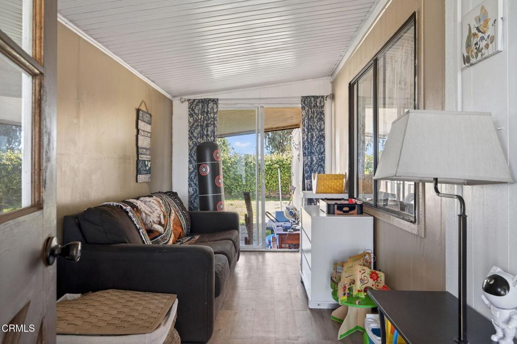 2408 Apple Lane, Unit 154 Oxnard, CA 93036 - Photo 5 of 46 a living room with furniture and a window
