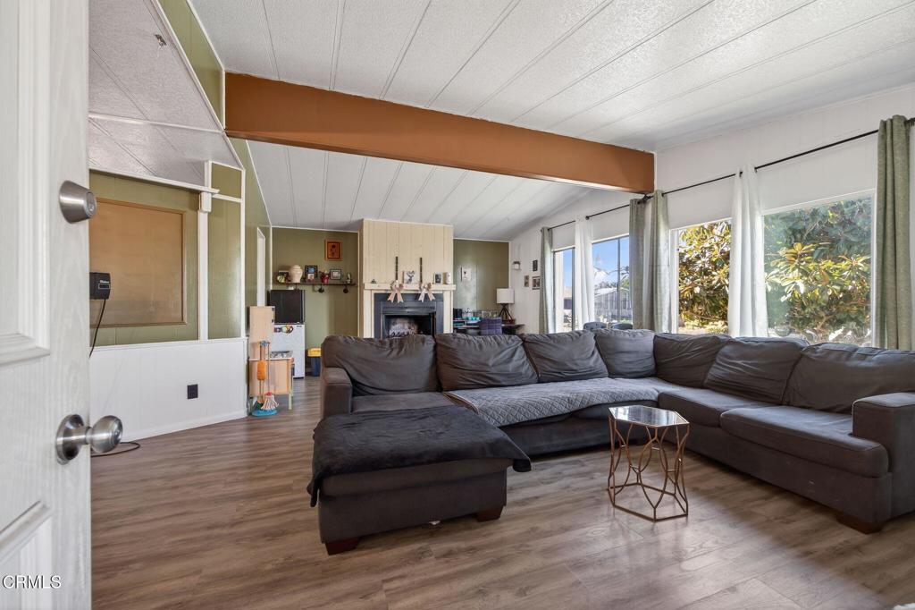 2408 Apple Lane, Unit 154 Oxnard, CA 93036 - Photo 6 of 46 a living room with furniture and a large window