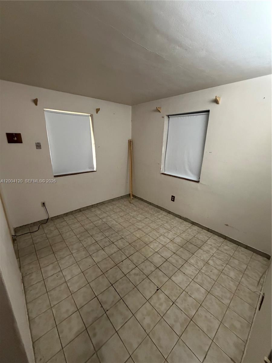 10910 Southwest 40th Street Miami, FL 33165 - Photo 11 of 40 Bedroom #1 downstairs