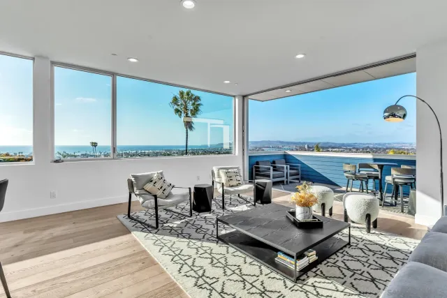 a living room with furniture and a table