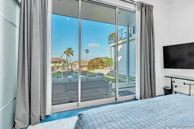 a view of swimming pool with seating area