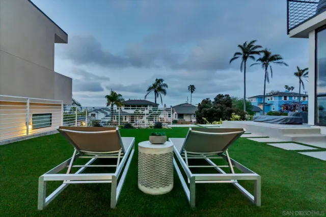 a garden view with a seating space