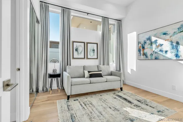 a bathroom with a granite countertop sink a toilet and a bathtub