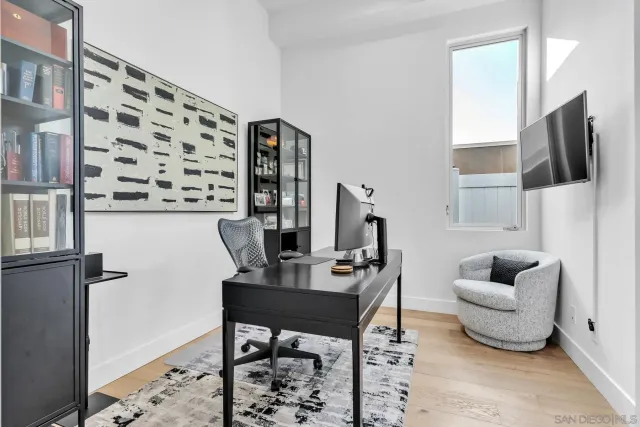a view of a terrace with furniture and city view