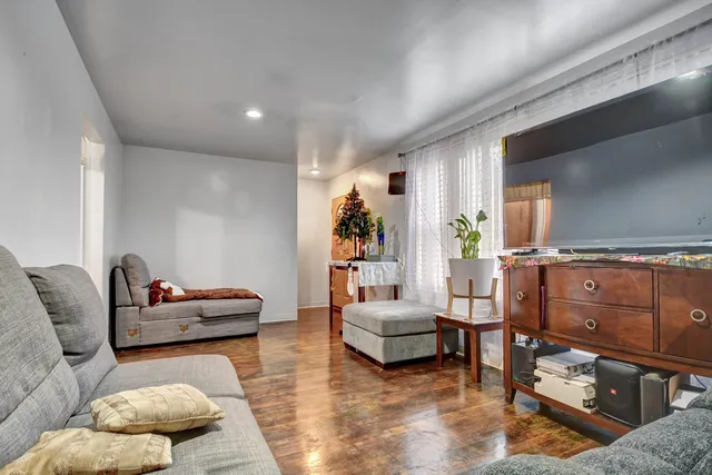 a living room with furniture and a couch