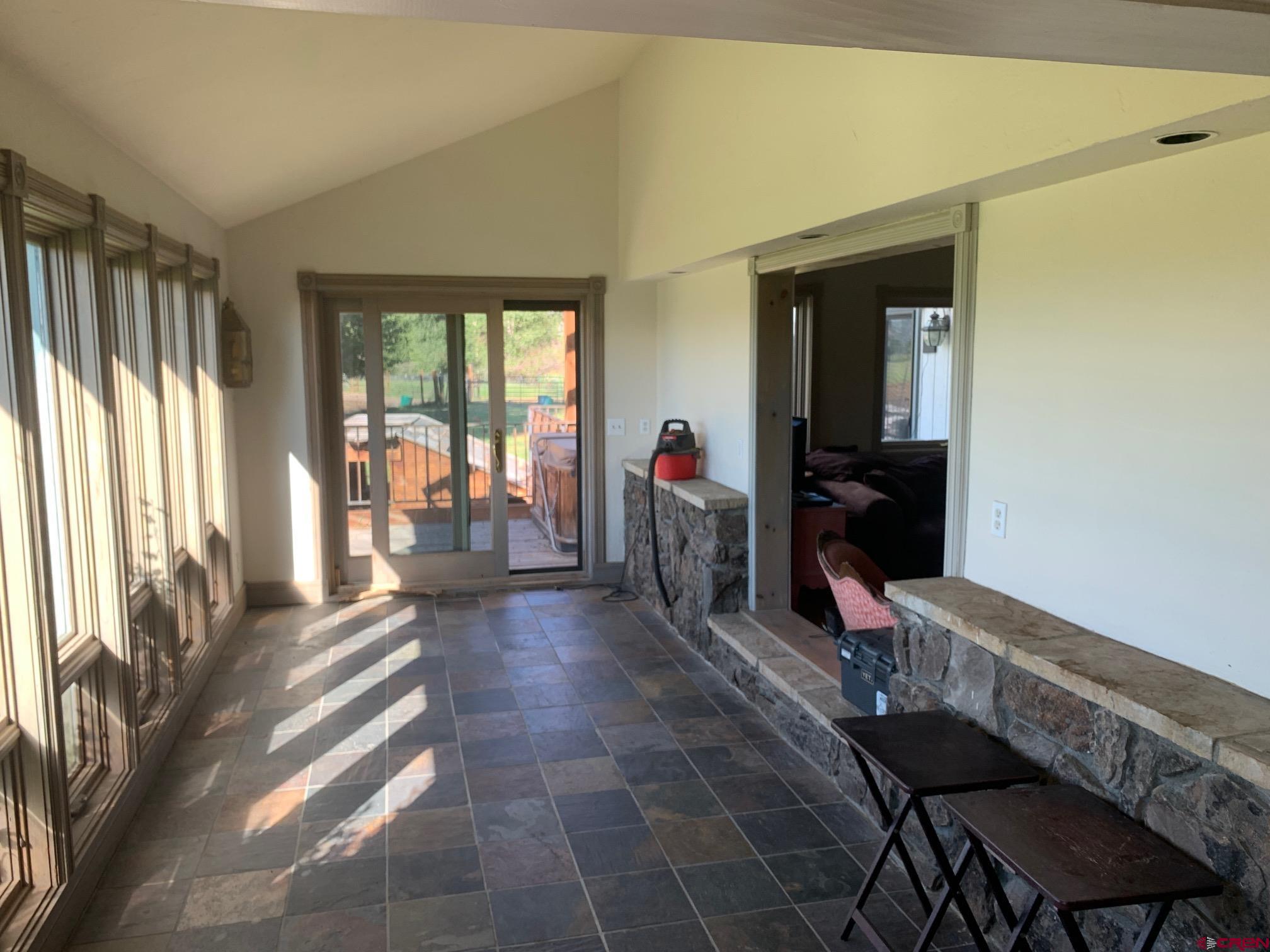 607 County Road 730 Gunnison, CO 81230 - Photo 27 of 35 a living room with furniture and a large window