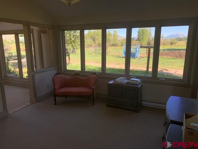 607 County Road 730 Gunnison, CO 81230 - Photo 29 of 35 a living room with furniture and a window