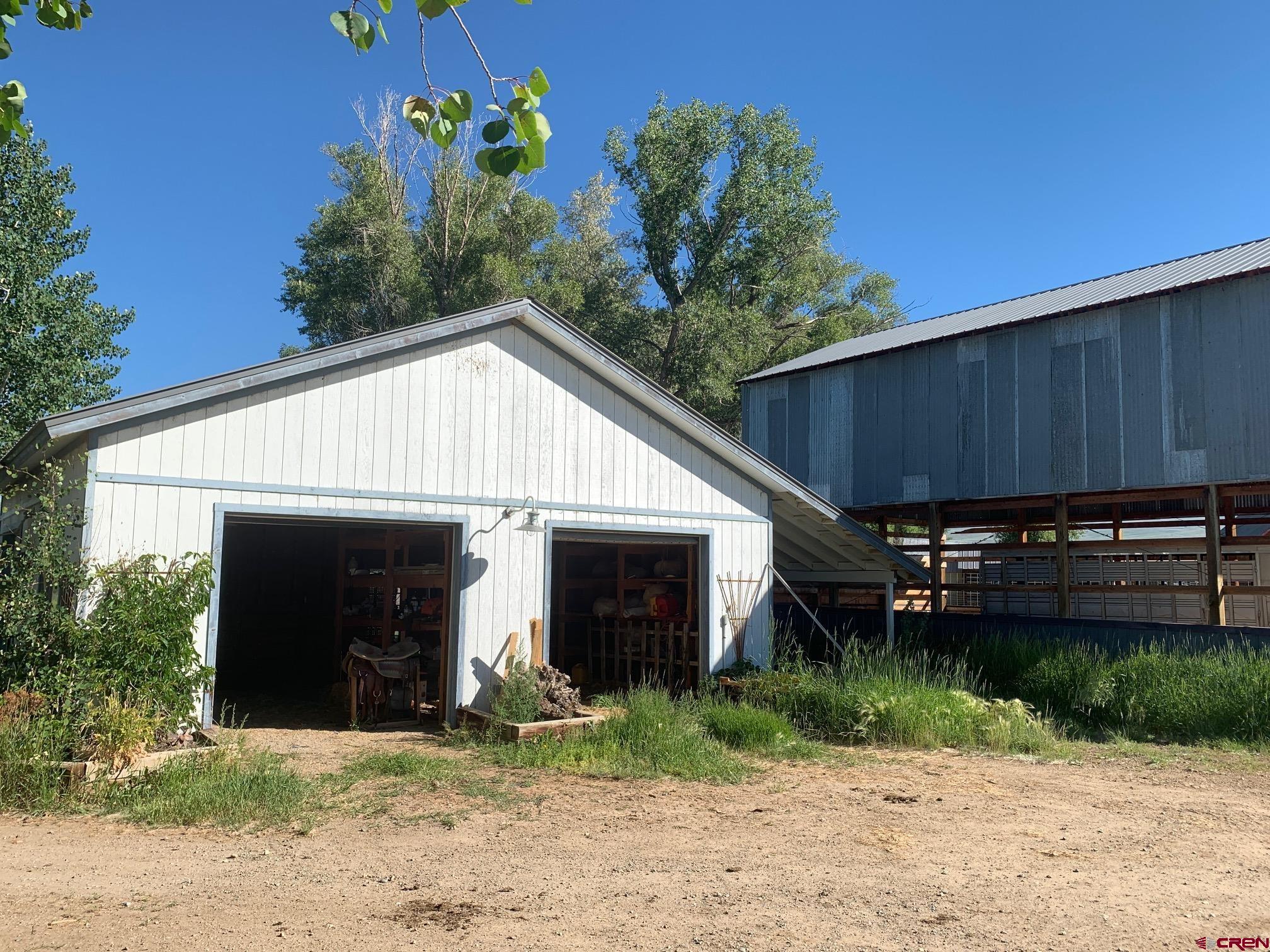 607 County Road 730 Gunnison, CO 81230 - Photo 30 of 35 a view of a house with a small yard and a large window