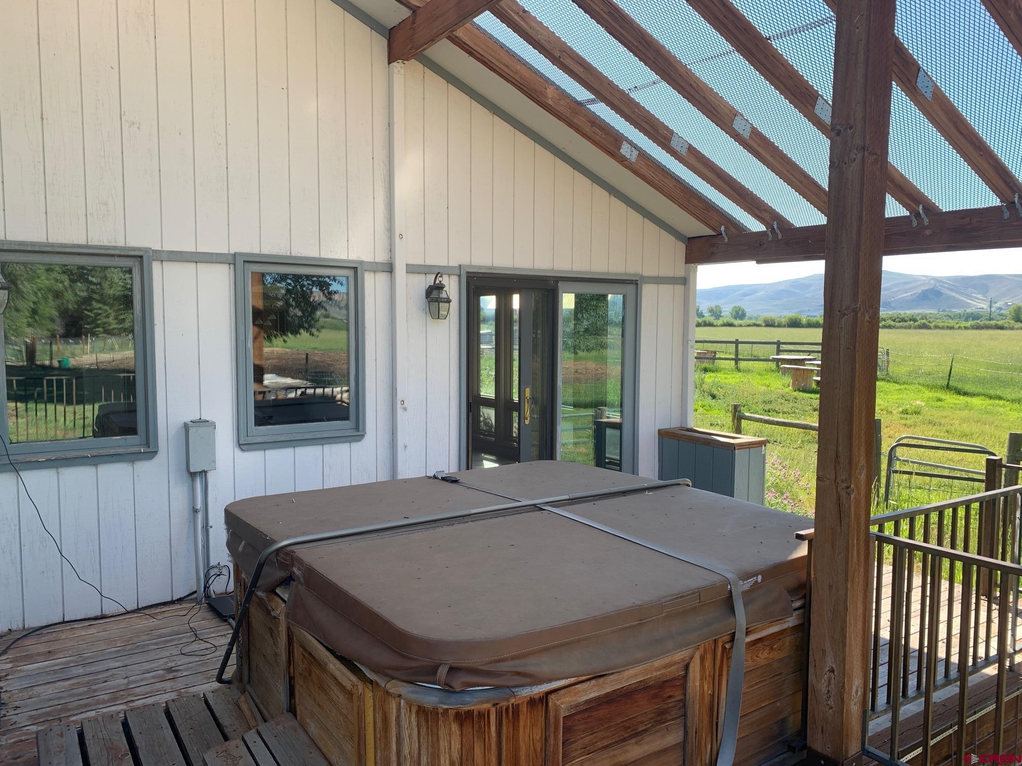 607 County Road 730 Gunnison, CO 81230 - Photo 31 of 35 a view of a patio with table and chairs
