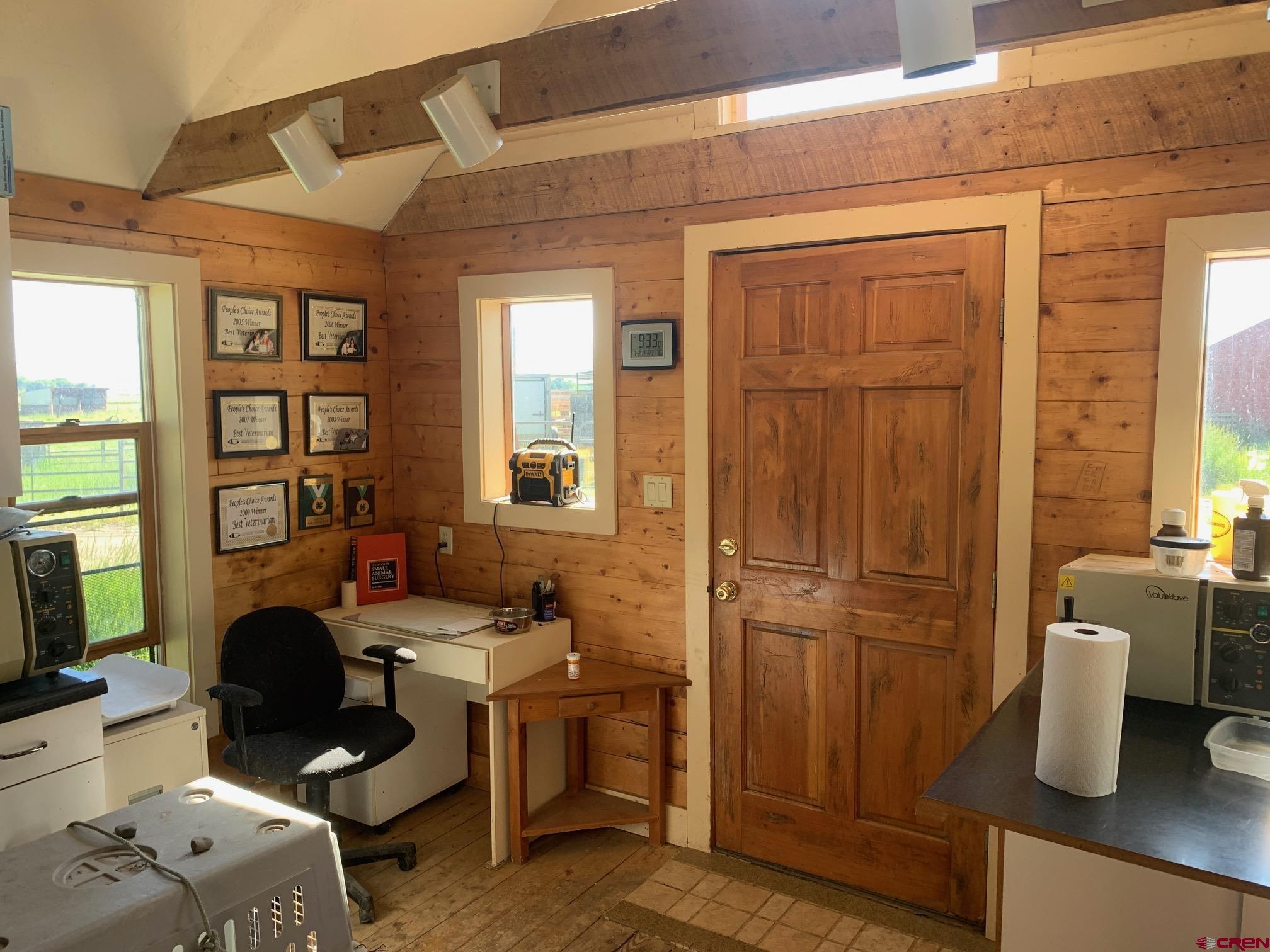 607 County Road 730 Gunnison, CO 81230 - Photo 33 of 35 a living room with furniture a window and wooden floor