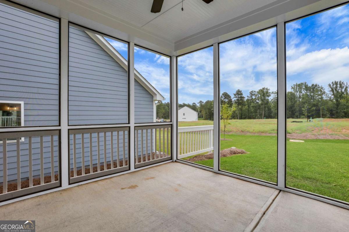 4250 Mary Ruth Way Loganville, GA 30052 - Photo 45 of 50 a view of a porch with a big yard