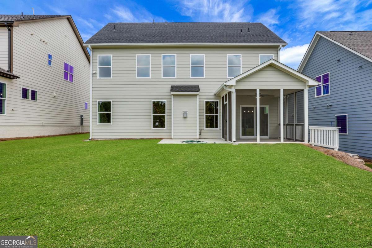 4250 Mary Ruth Way Loganville, GA 30052 - Photo 49 of 50 a front view of a house with a garden