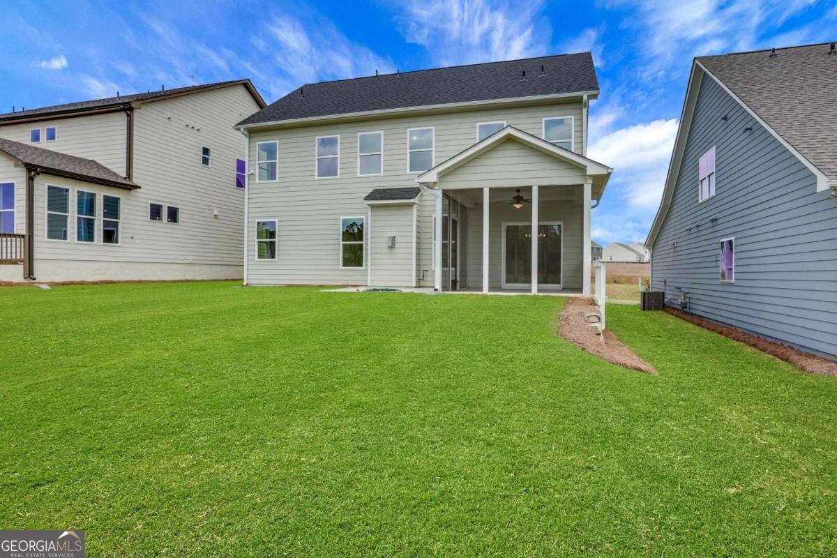 4250 Mary Ruth Way Loganville, GA 30052 - Photo 50 of 50 a view of a house with a yard