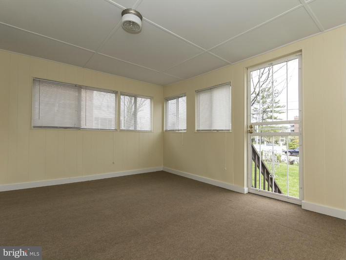 5115 Sunset Road Baltimore, MD 21215 - Photo 16 of 24 an empty room with a empty space and a window