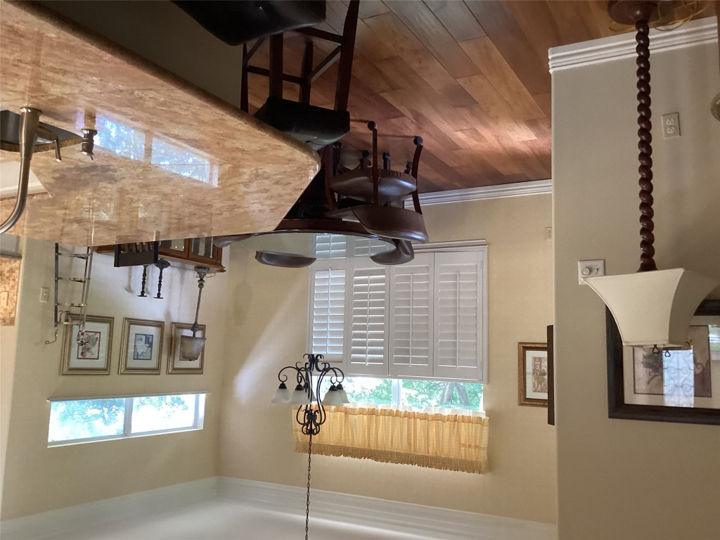 128 Crystal Springs Drive Georgetown, TX 78633 - Photo 7 of 7 a view of a dining room with furniture window and wooden floor