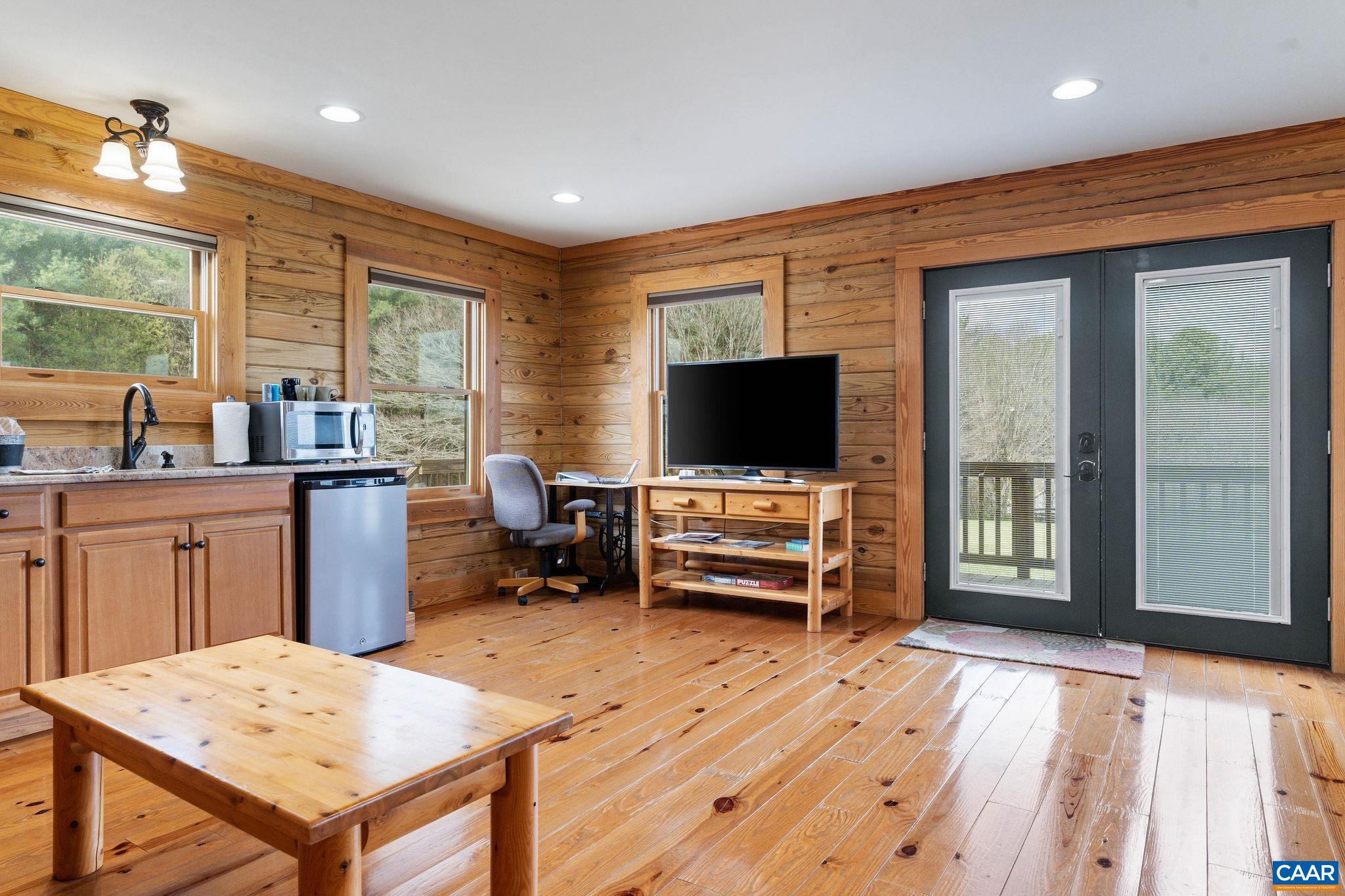 42 River Ridge Lane Stanardsville, VA 22973 - Photo 55 of 70 a living room with furniture and a flat screen tv