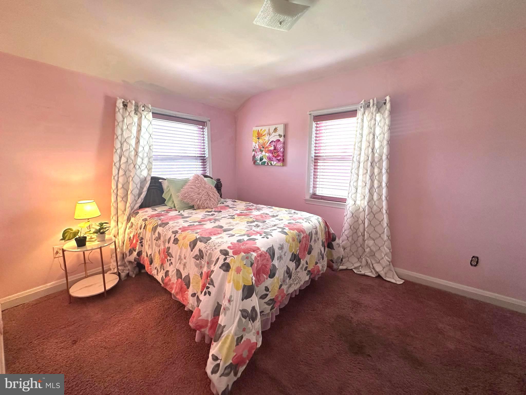 8454 Kavanagh Road Baltimore, MD 21222 - Photo 15 of 23 a bedroom with a bed and window