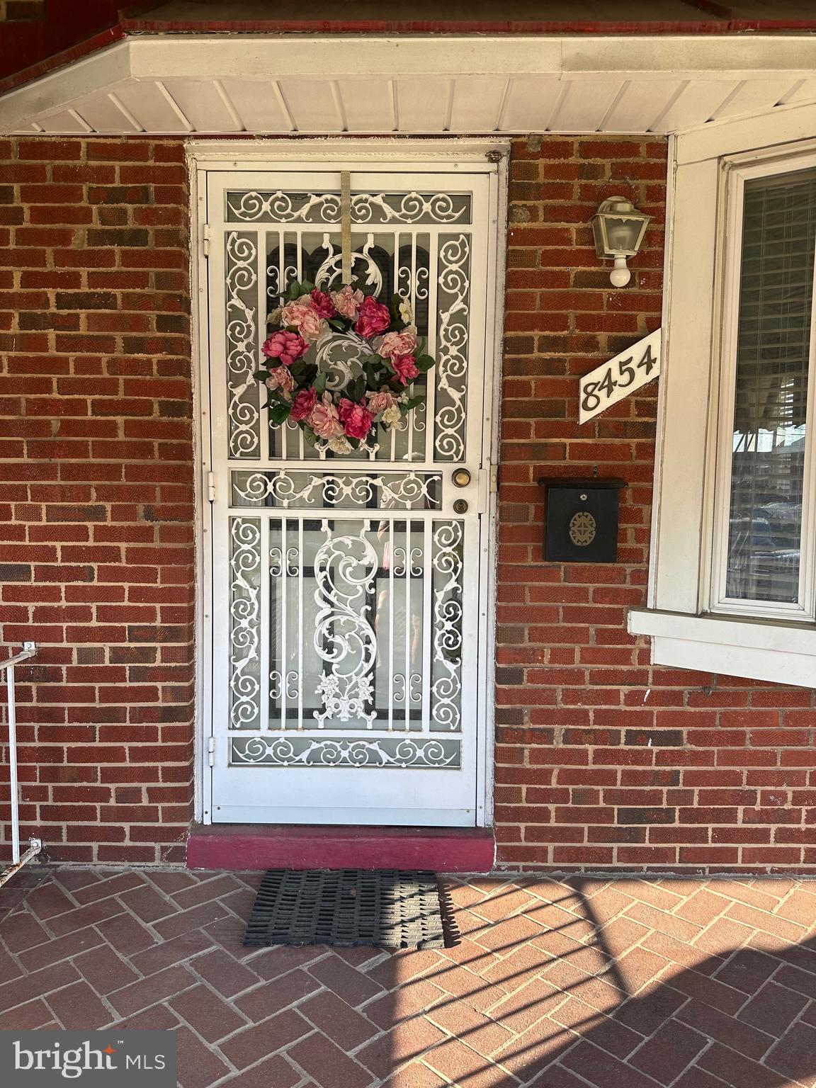 8454 Kavanagh Road Baltimore, MD 21222 - Photo 3 of 23 a view of a door with a door and wooden wall