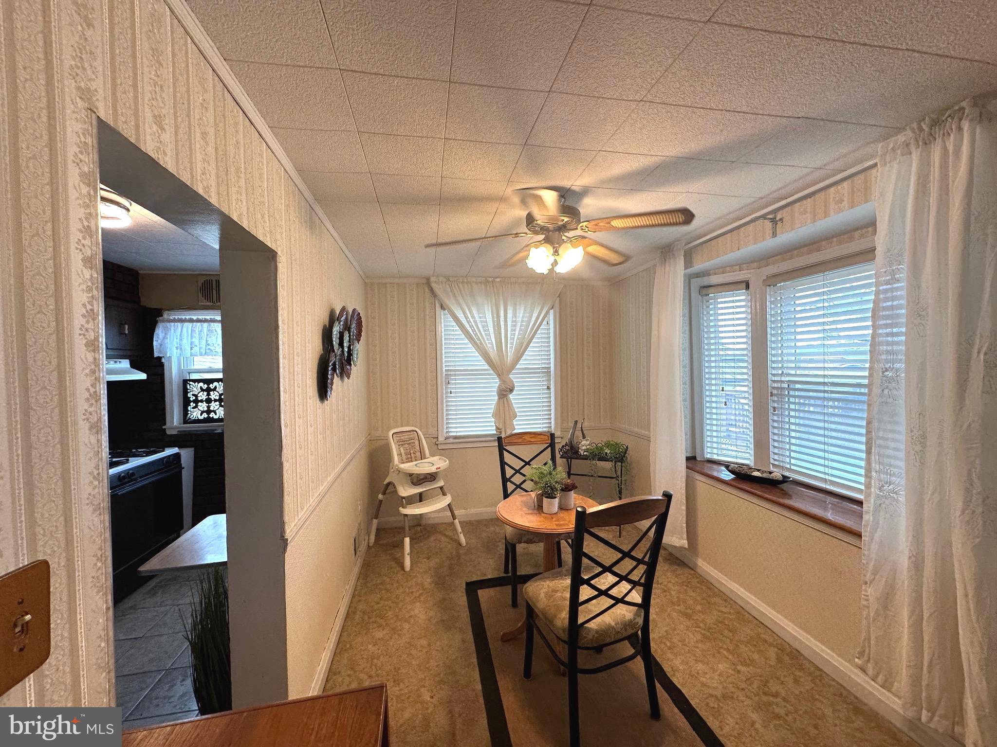 8454 Kavanagh Road Baltimore, MD 21222 - Photo 10 of 23 a dining room with furniture and window