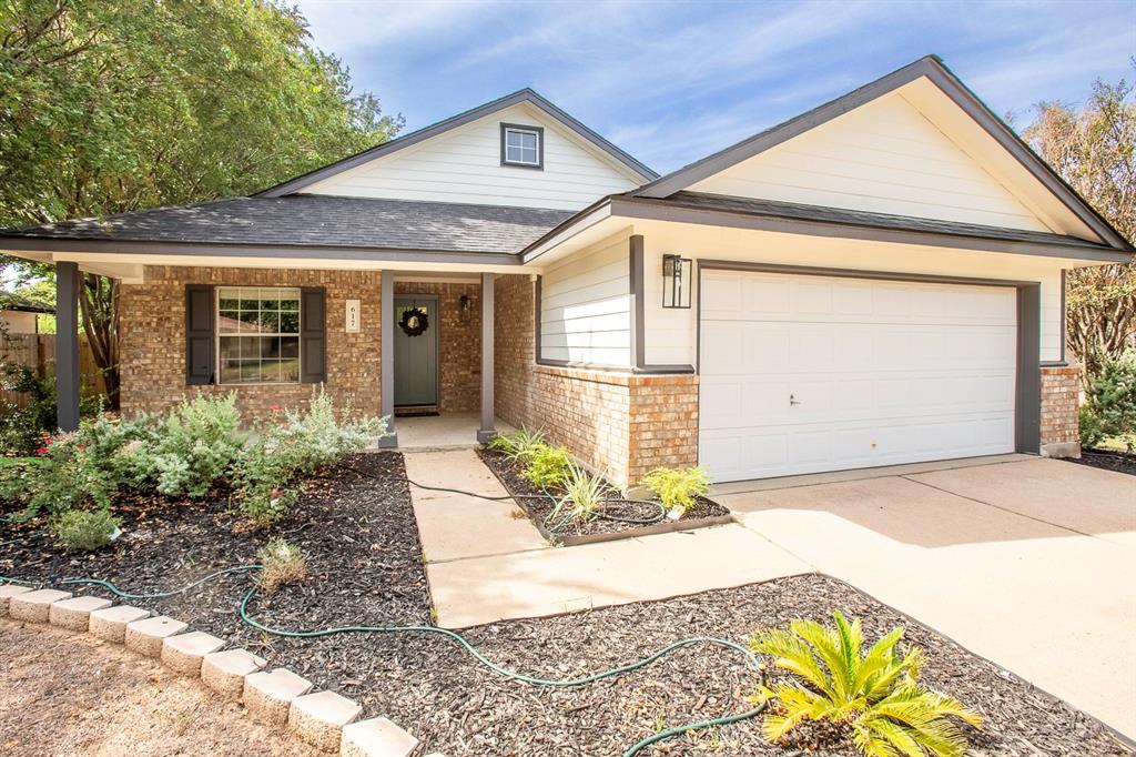 617 Barbara Way Bastrop, TX 78602 - Photo 1 of 20 A charming brick and siding facade with a welcoming covered entry and integrated garage.