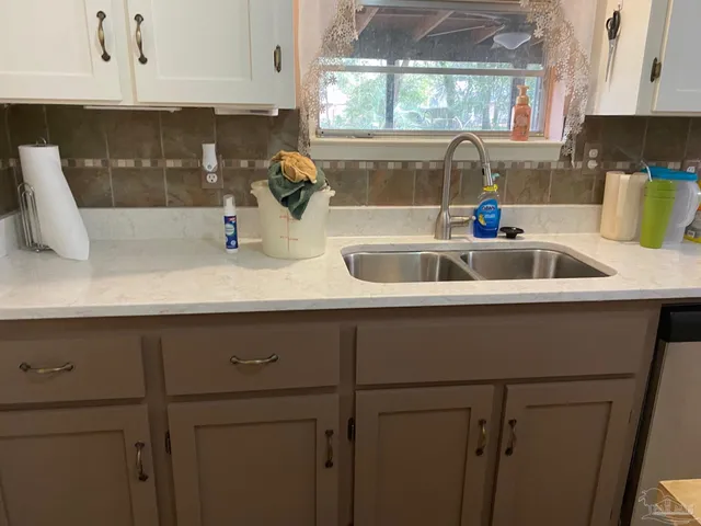 a close view of sink and microwave
