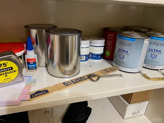 a view of empty room with large windows