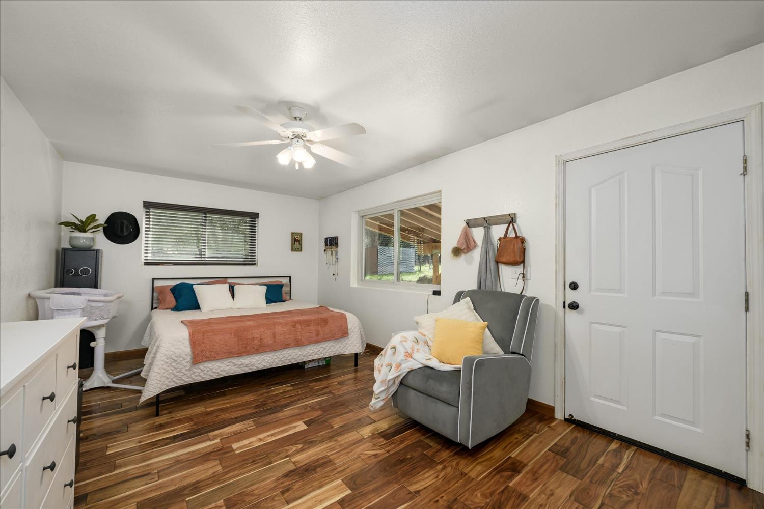 3640 Omo Ranch Road Somerset, CA 95684 - Photo 25 of 57 a bed room with a bed and a couch