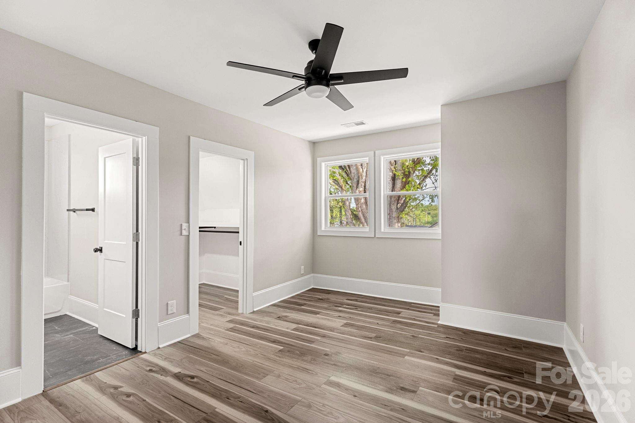 918 North New Hope Road Gastonia, NC 28054 - Photo 28 of 37 wooden floor in an empty room with a window