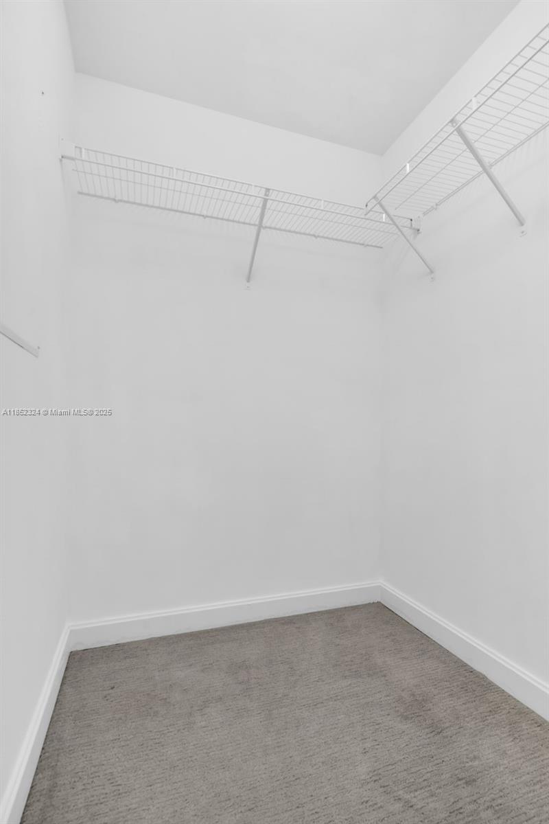 45 Southwest 9th Street, Unit 2204 Miami, FL 33130 - Photo 23 of 39 a view of an empty walk in closet
