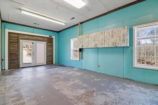 1828 4 Mile Church Road Ball Ground, GA 30107 - Photo 27 of 46 an empty room with windows and closet