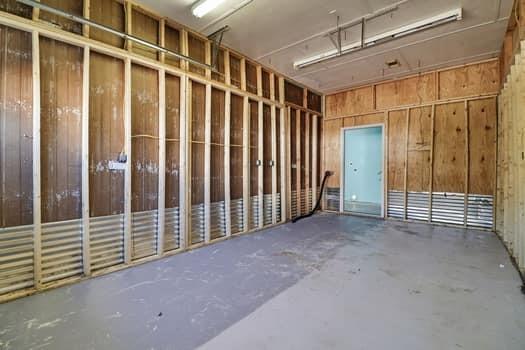 1828 4 Mile Church Road Ball Ground, GA 30107 - Photo 35 of 46 a view of empty room with wooden walls