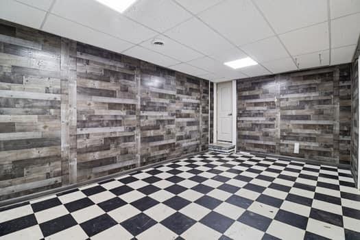 1828 4 Mile Church Road Ball Ground, GA 30107 - Photo 39 of 46 a bathroom with a black and white checkered floor