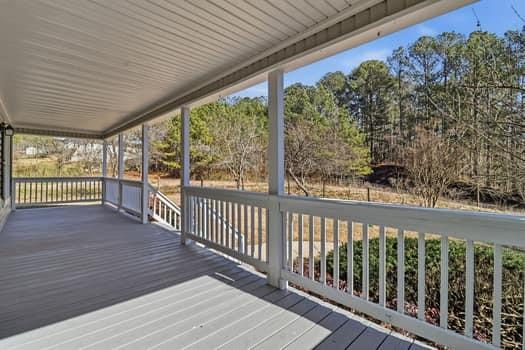 1828 4 Mile Church Road Ball Ground, GA 30107 - Photo 7 of 46 a view of a wooden deck