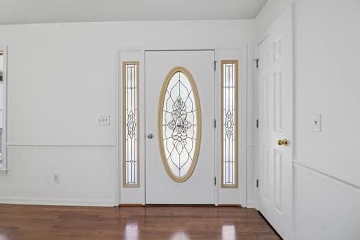 1828 4 Mile Church Road Ball Ground, GA 30107 - Photo 10 of 46 a view of door with wooden door