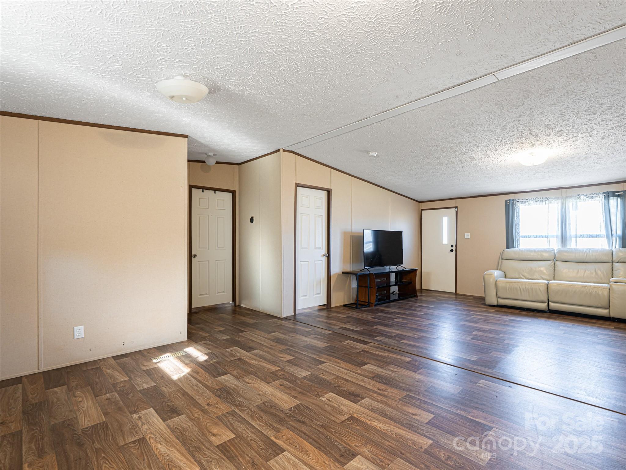 4148 Tallent Road Morganton, NC 28655 - Photo 12 of 30 a view of a livingroom with furniture oven cabinets and a living room