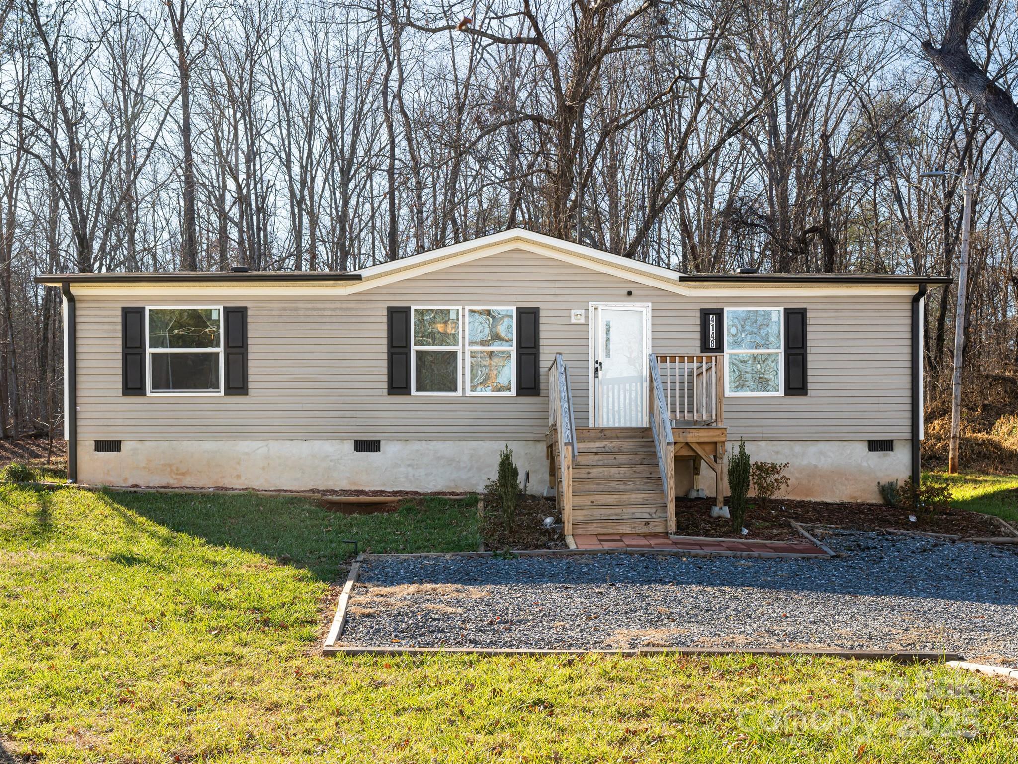 4148 Tallent Road Morganton, NC 28655 - Photo 2 of 30 a front view of a house with garden