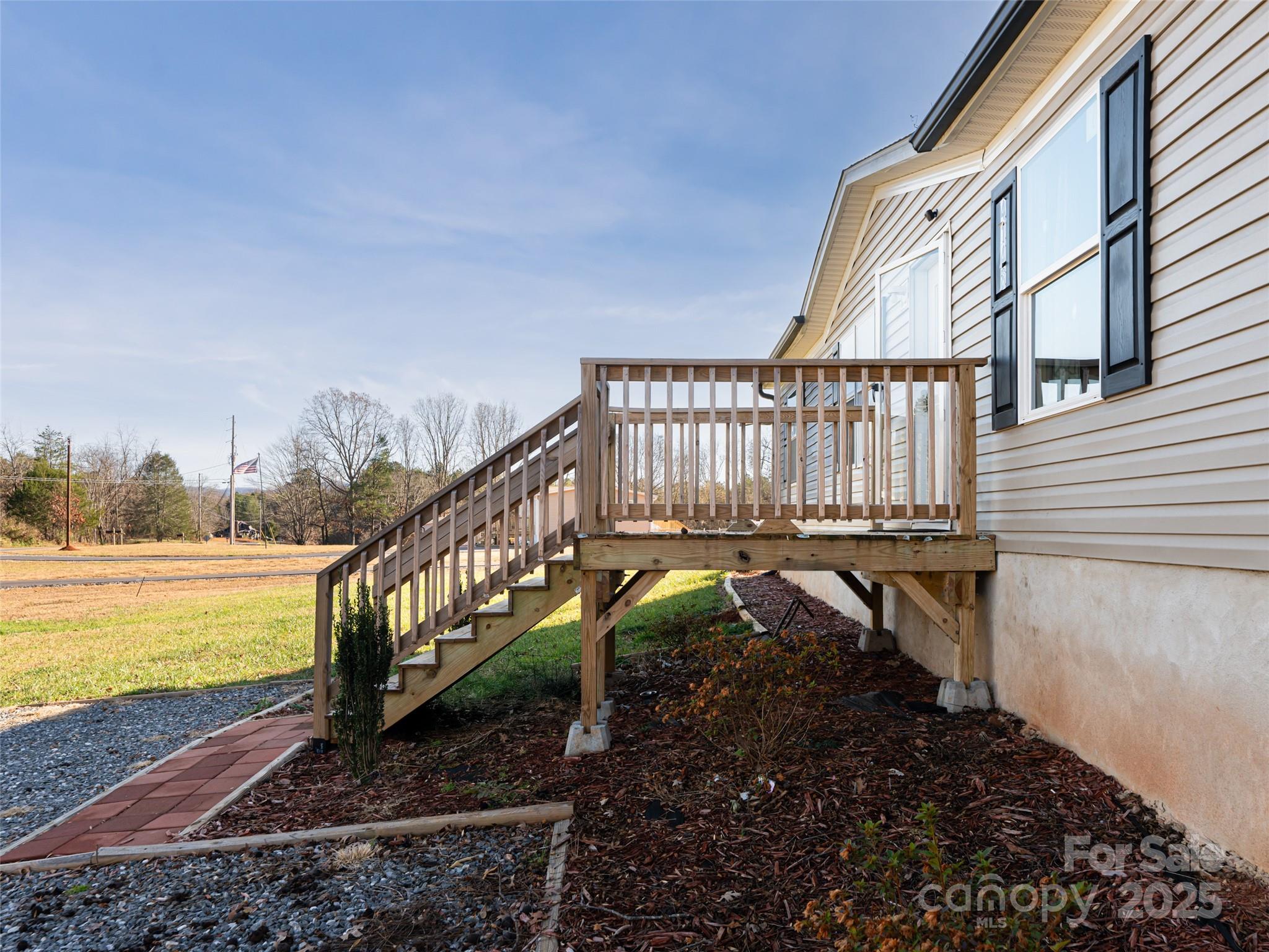 4148 Tallent Road Morganton, NC 28655 - Photo 6 of 30 a view of a roof deck with wooden floor and fence