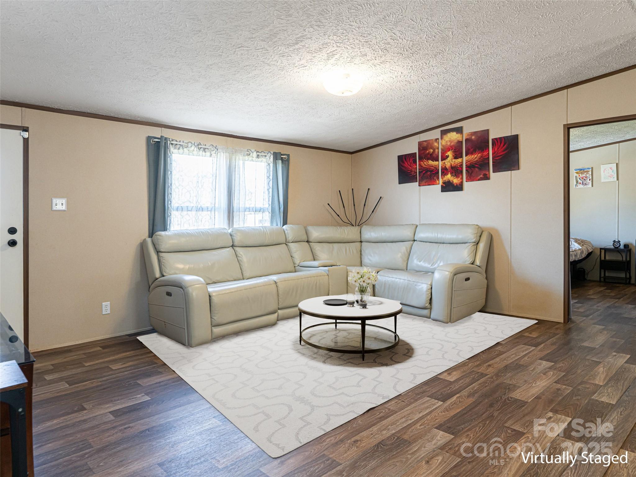 4148 Tallent Road Morganton, NC 28655 - Photo 8 of 30 a living room with furniture and a wooden floor