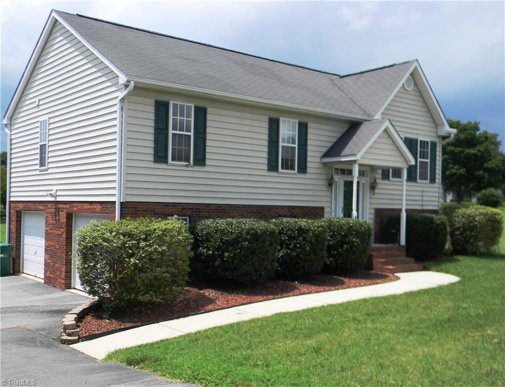4680 Hampton Road Clemmons, NC 27012 - Photo 2 of 27 Low Maintenance Exterior and 2 Car Lower Level Garage
