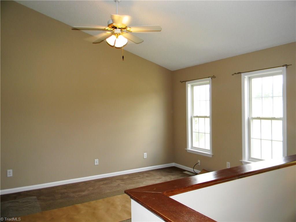 4680 Hampton Road Clemmons, NC 27012 - Photo 5 of 27 Living Room has Cathedral Ceiling and Ceiling Fan - Very Comfortable!
