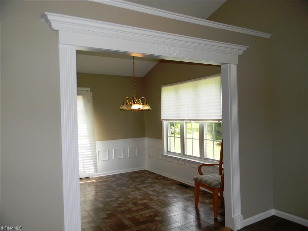 4680 Hampton Road Clemmons, NC 27012 - Photo 8 of 27 Breakfast Room with Large Window and Shadowbox Molding