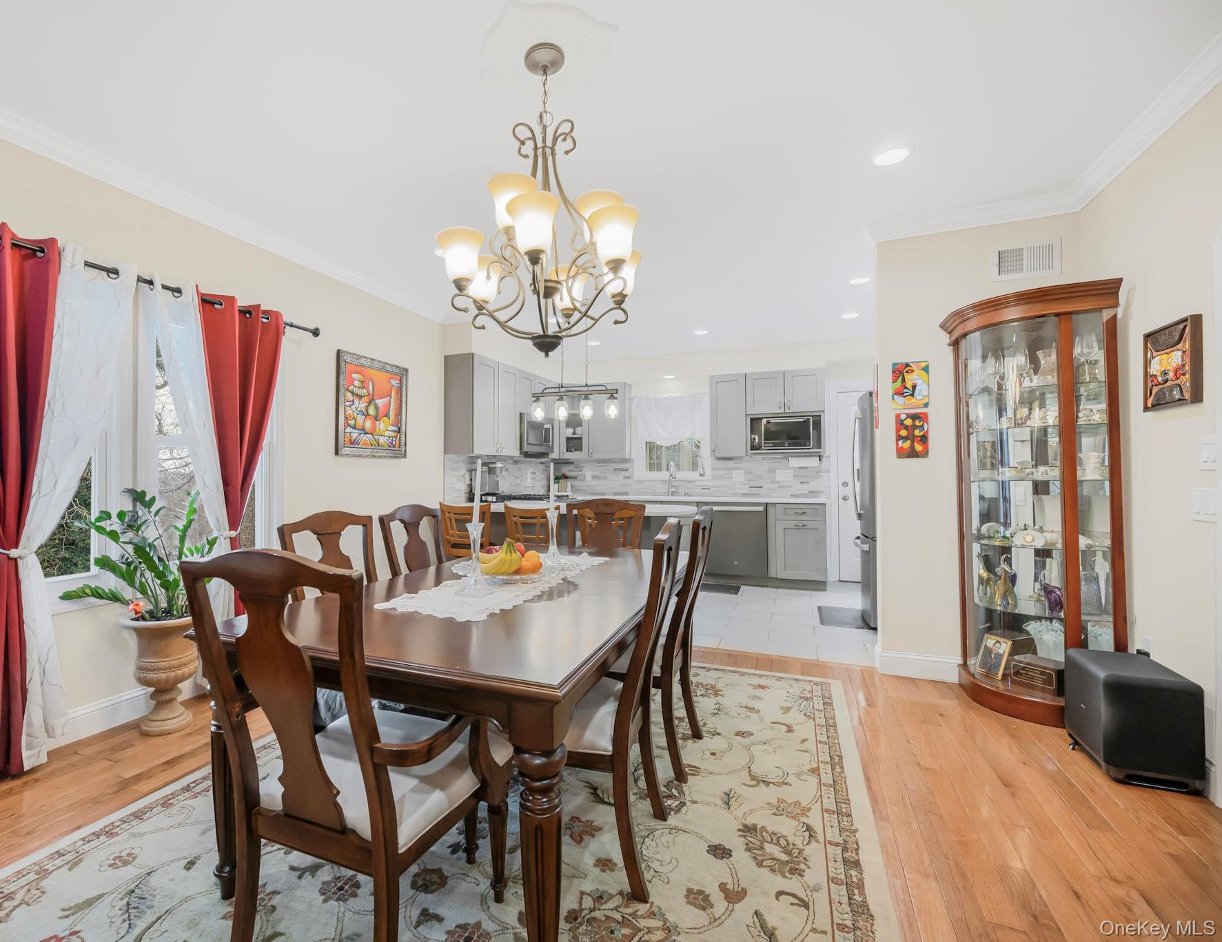 248 Rockne Road Yonkers, NY 10701 - Photo 26 of 40 Dining room featuring crown molding, a chandelier, light wood finished floors, and recessed lighting