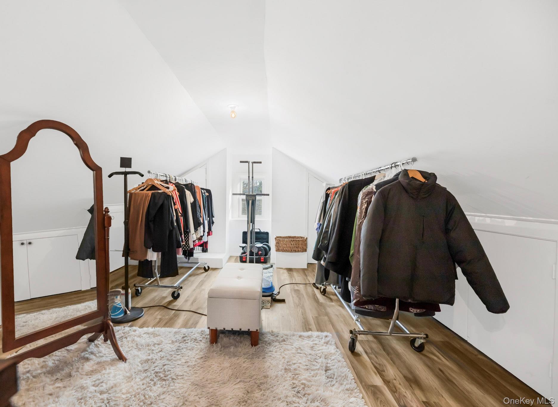 248 Rockne Road Yonkers, NY 10701 - Photo 31 of 40 Walk in closet with vaulted ceiling and wood finished floors